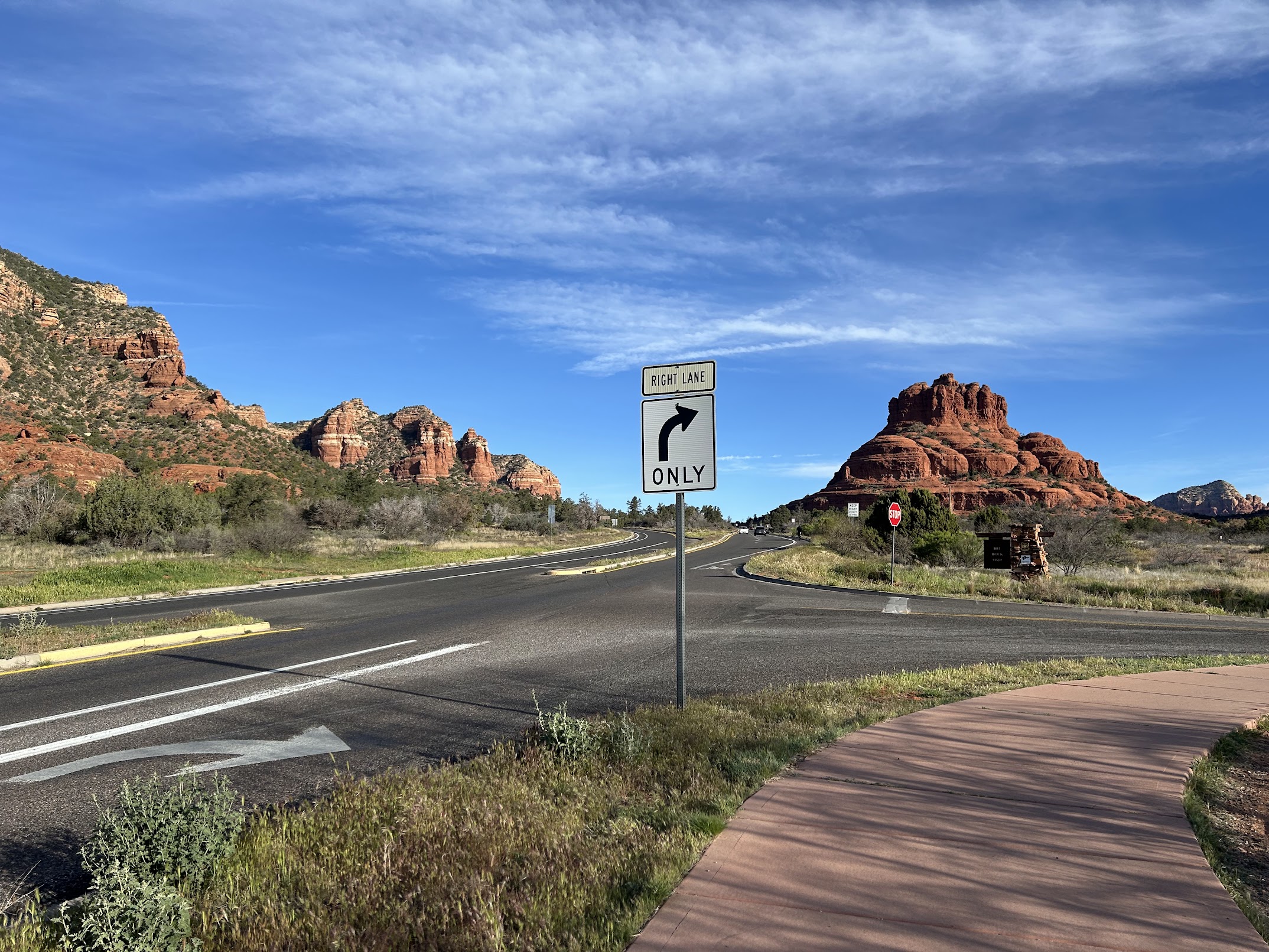Morning run route with red rock formations and a right-turn sign in Sedona